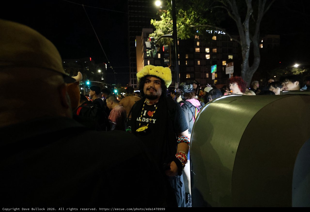 Festival Reveler in Pikachu Hat at Night Celebration