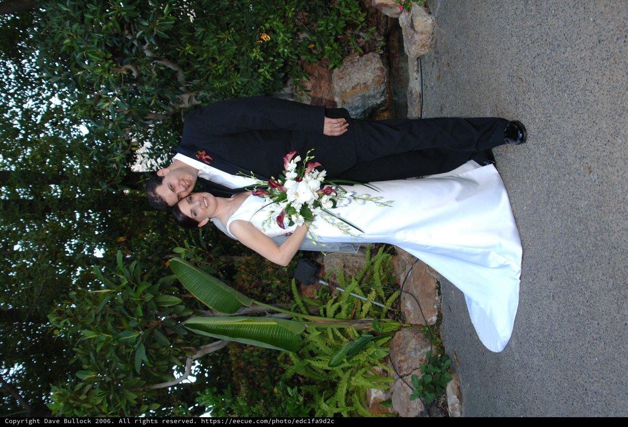 Bride and Groom Portrait in Lush Garden Setting