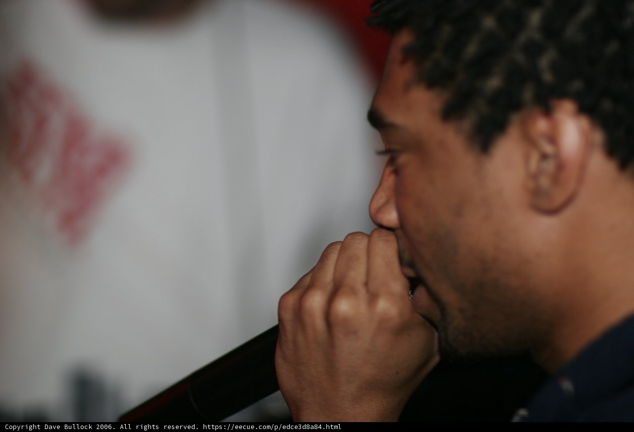 Pensive Man with Microphone