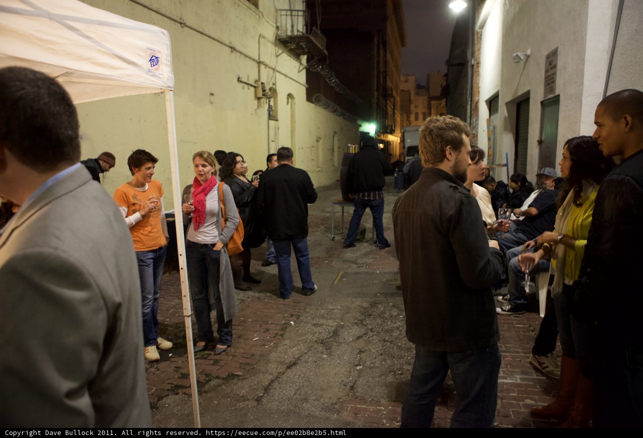 Nighttime Gathering in an Urban Alleyway