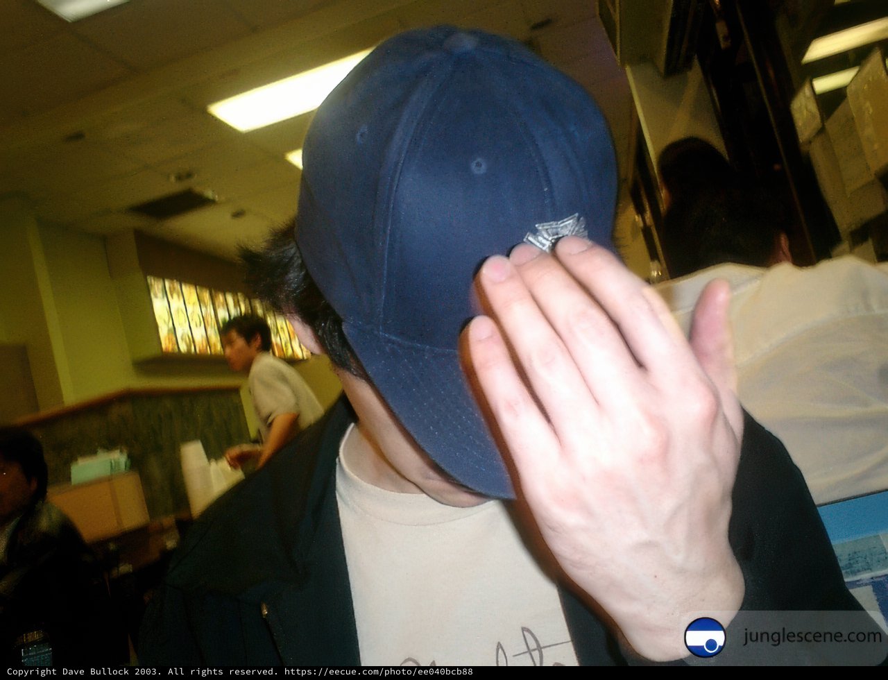 The Mysterious Man in the Hat