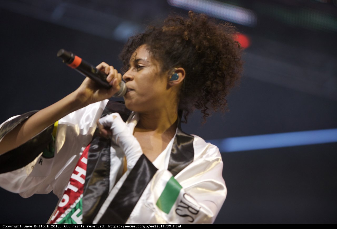Curly-Haired Songstress