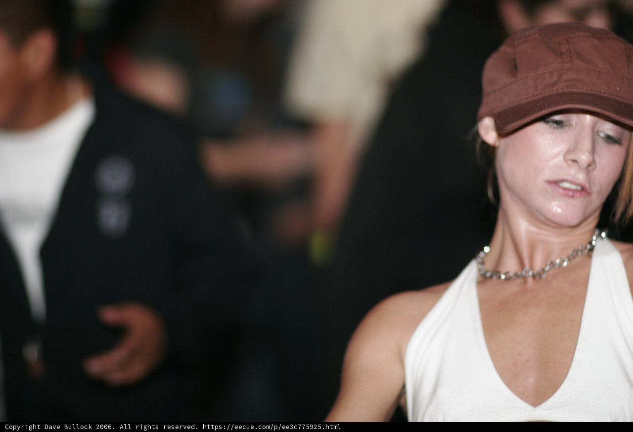 White Tank Top and Baseball Hat