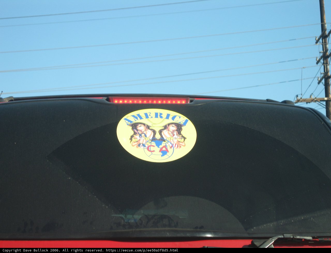 Emblematic Sticker on a Red SUV