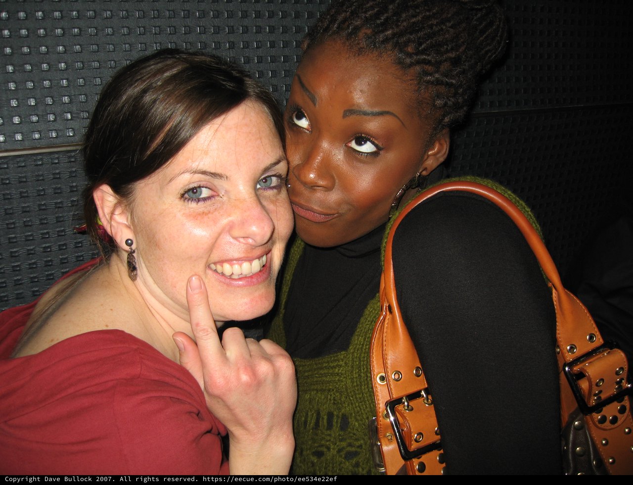 Two Friends Posing Together at Night Club