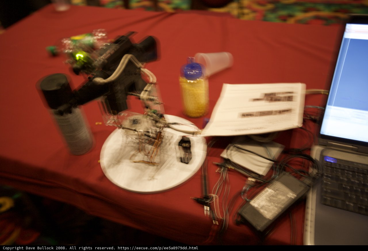 Laptop and Robot on Desk