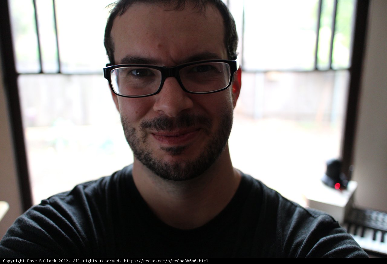 A Happy Man in Glasses