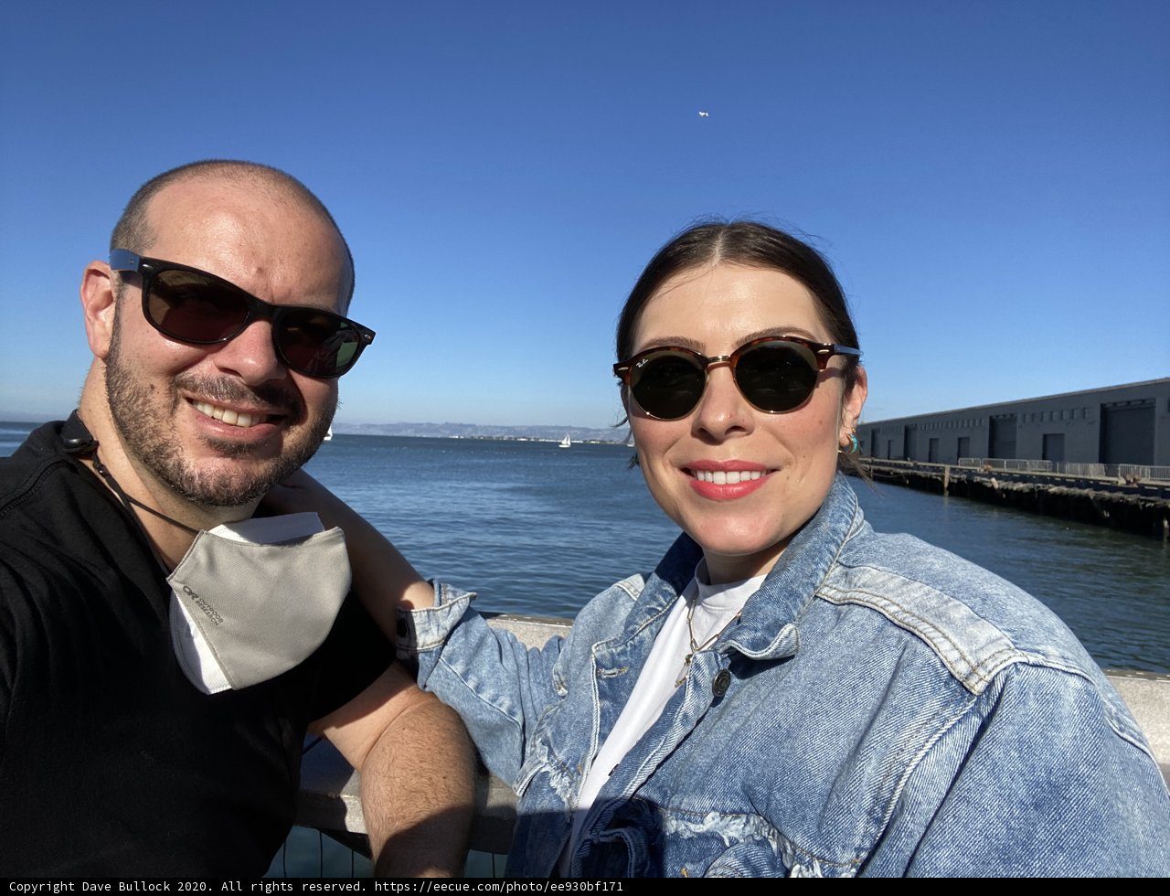 Smiling Couple Captures the Perfect Selfie by the Water