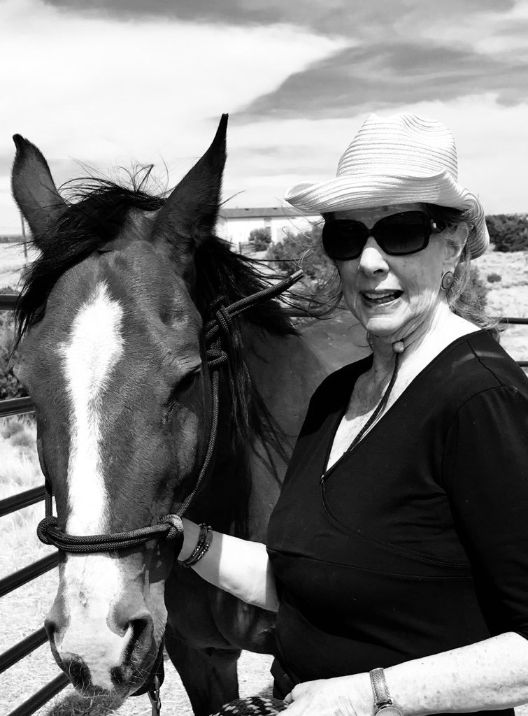 Woman and Horse Portrait in Desert Setting