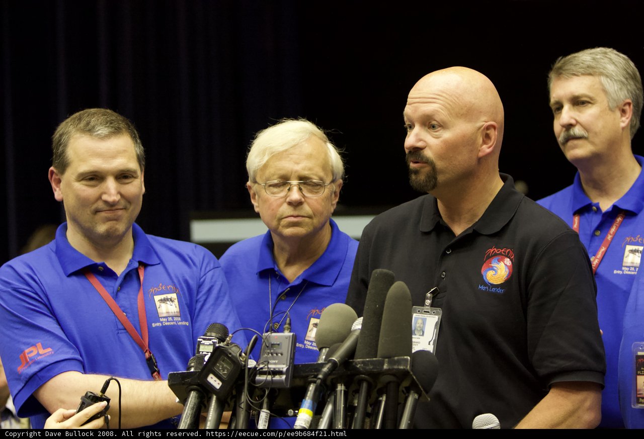 Press Conference with Blue-Shirted Men