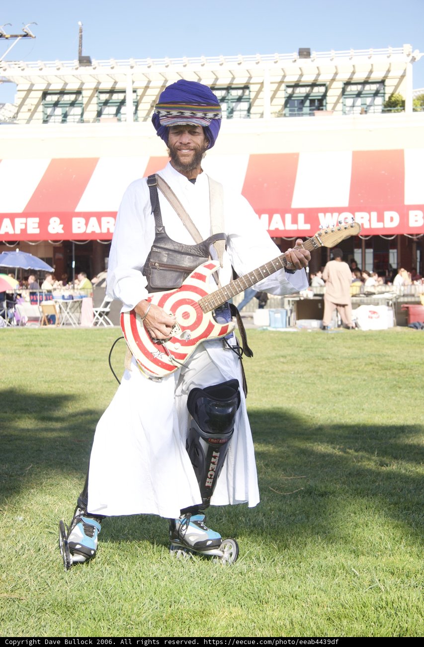 Turbaned Guitarist Serenades Under the Blue Sky