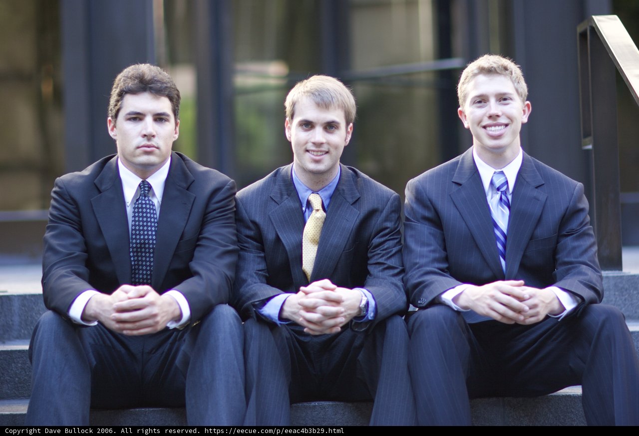 Three Men in Elegant Suits Pose for Flexilis Shoot