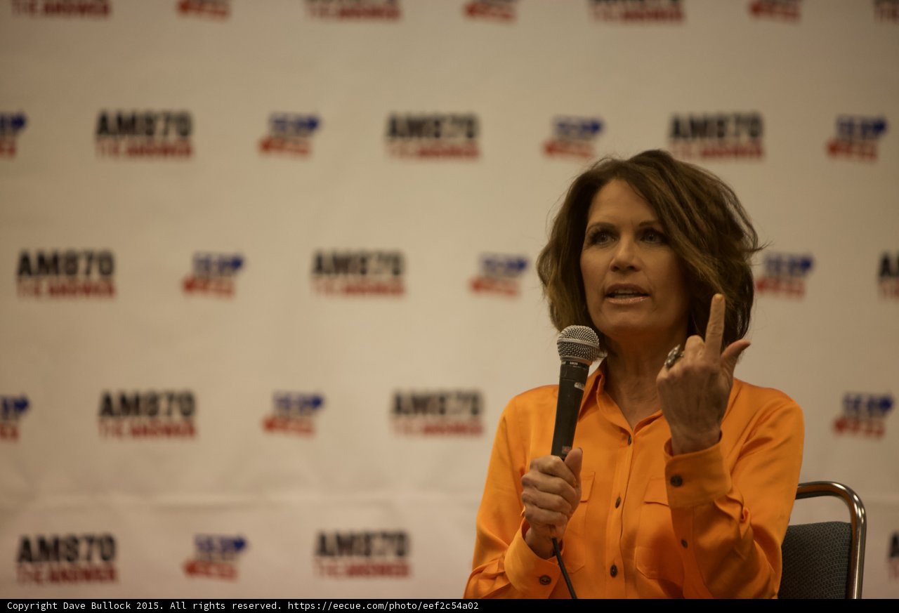 Woman Shows Peace Sign at Politicon 2015