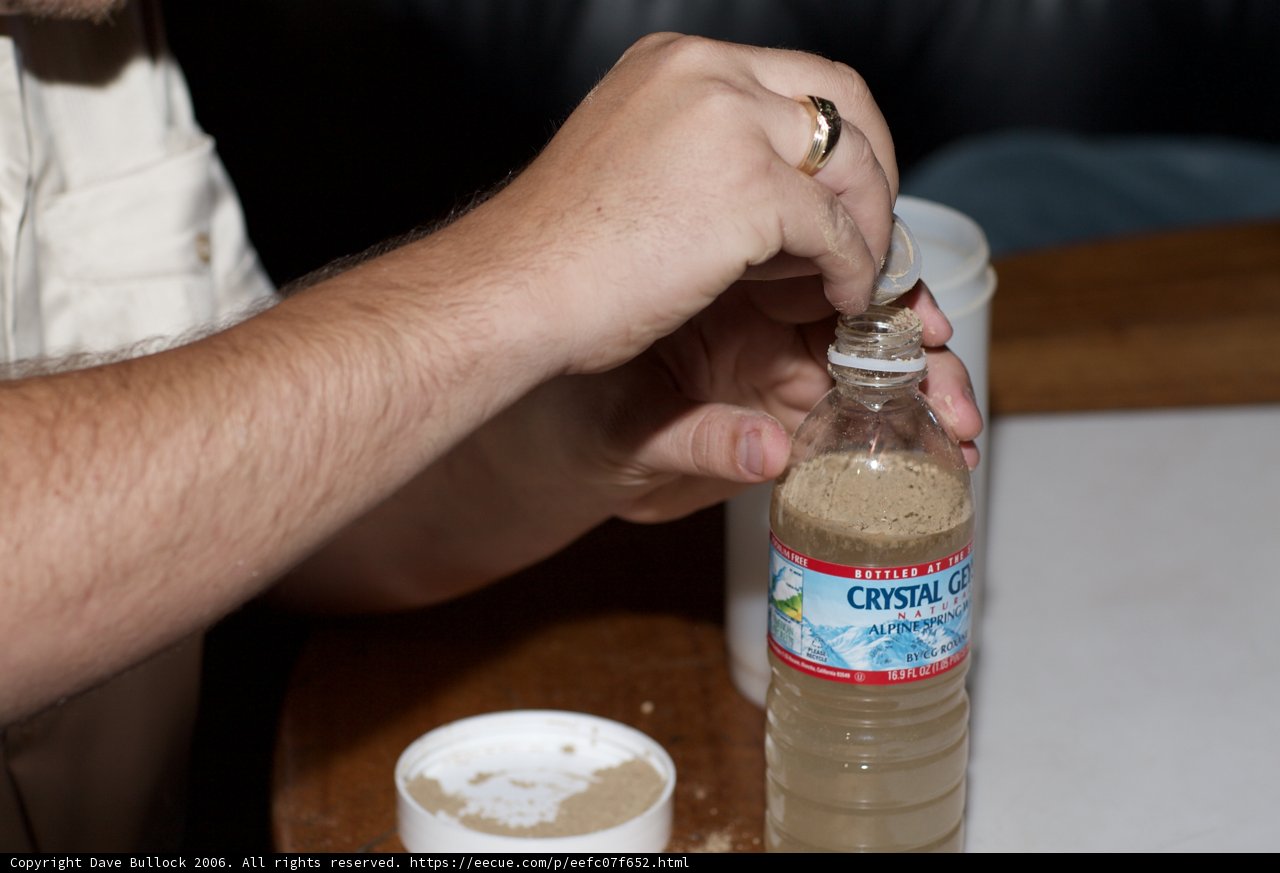 Pouring Something into a Bottle