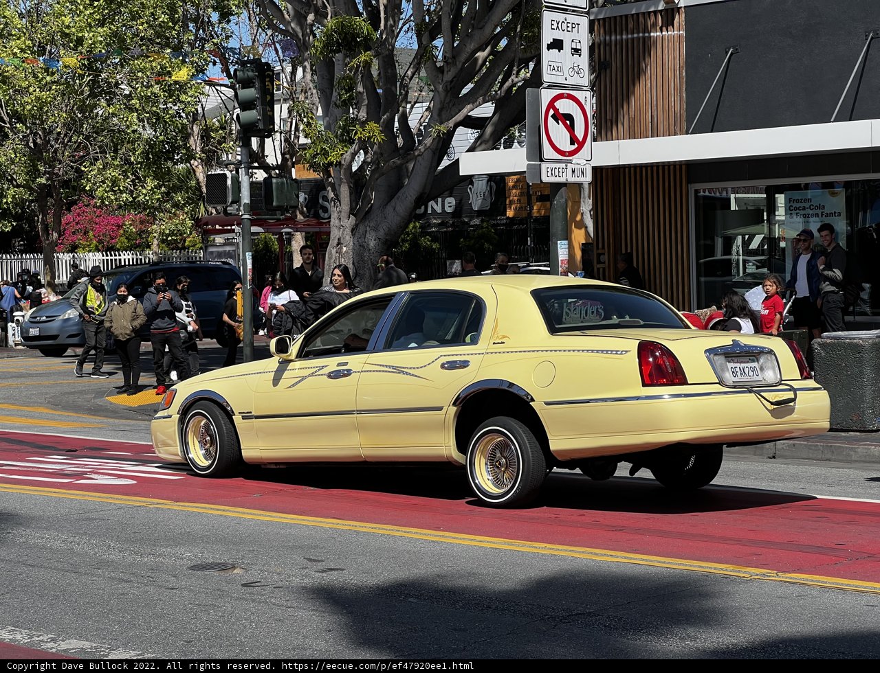 Yellow sports car with a bold wing