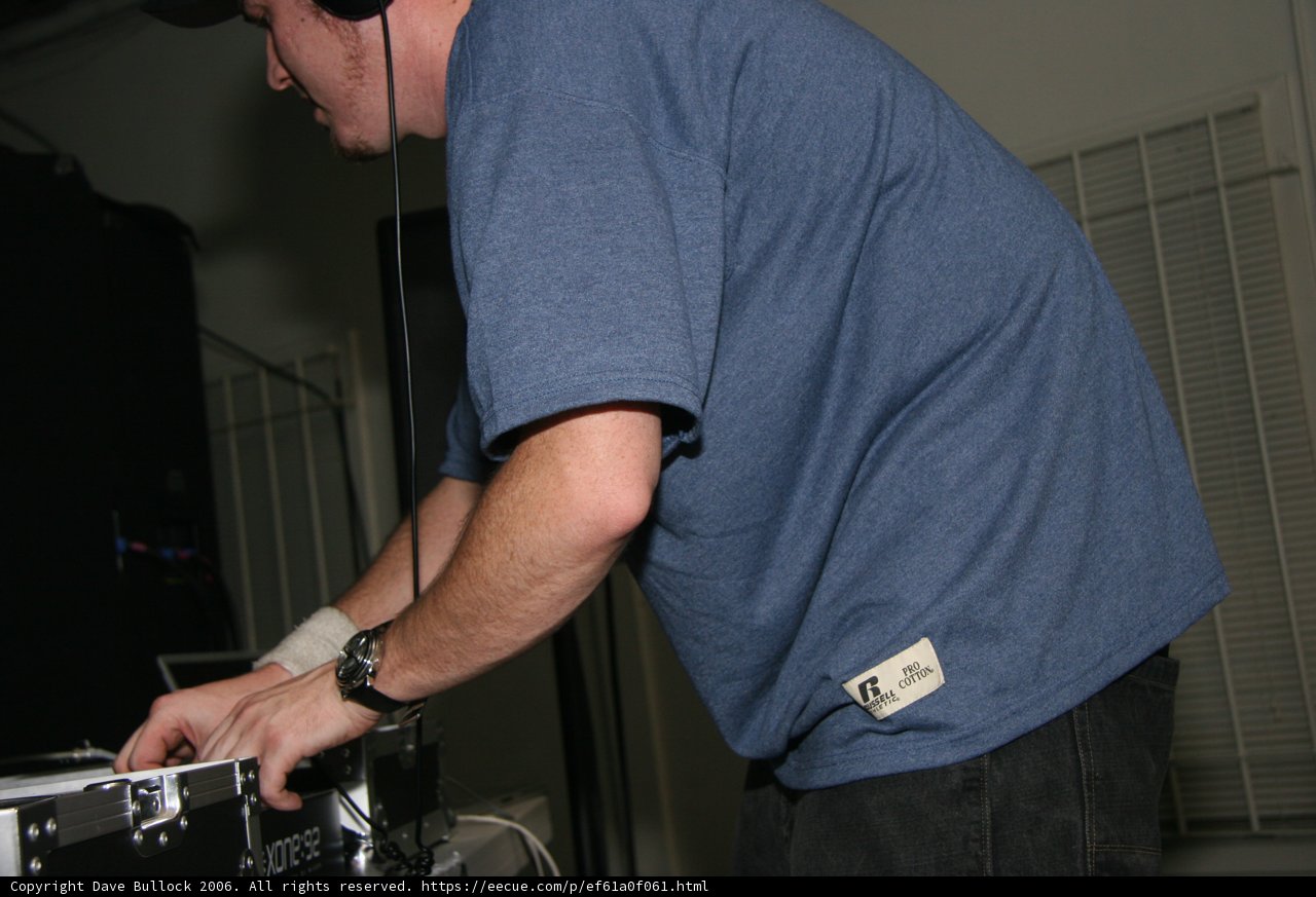 Blue Shirted Deejay Rocks the Night Away