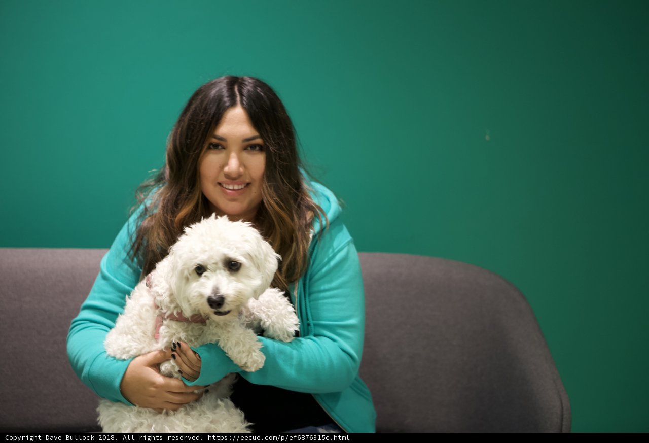 Woman and her White Poodle Puppy