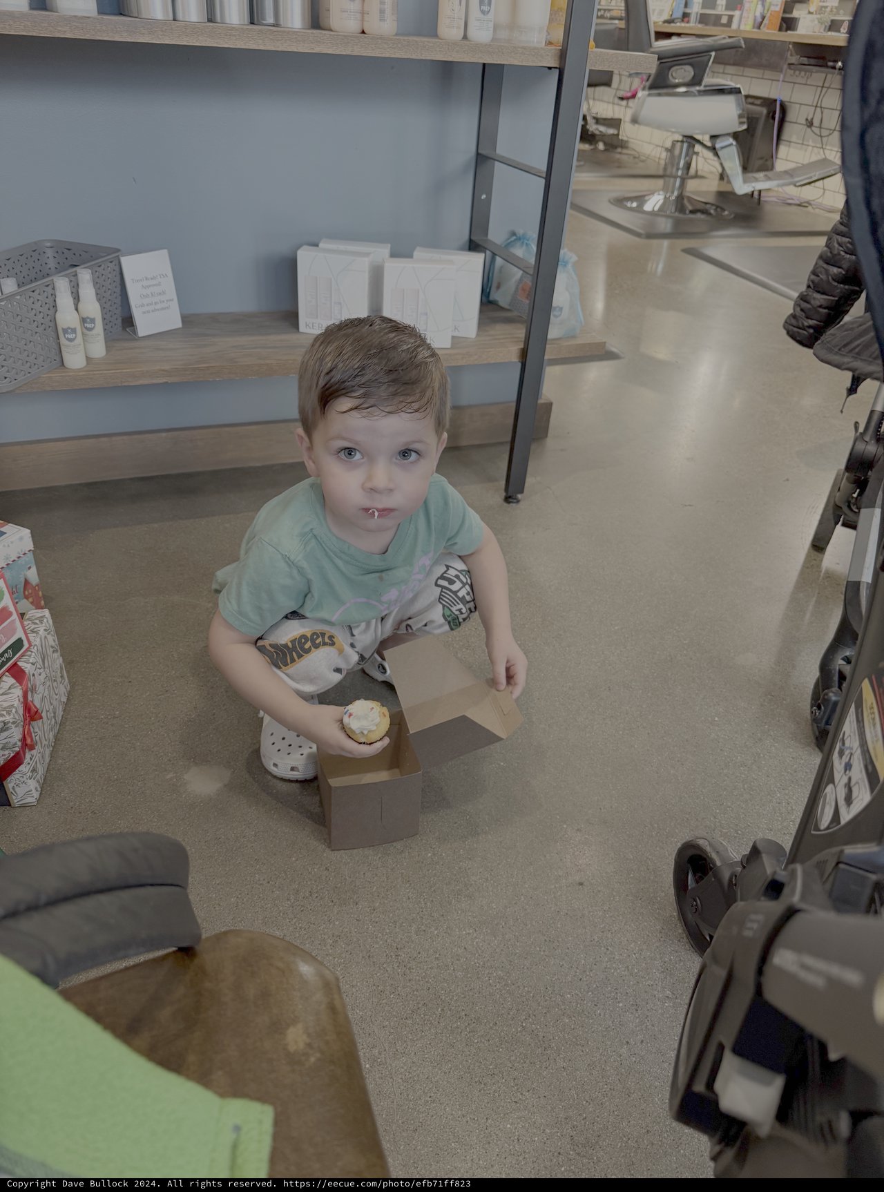 Young Boy Playing in Commercial Kitchen Setting