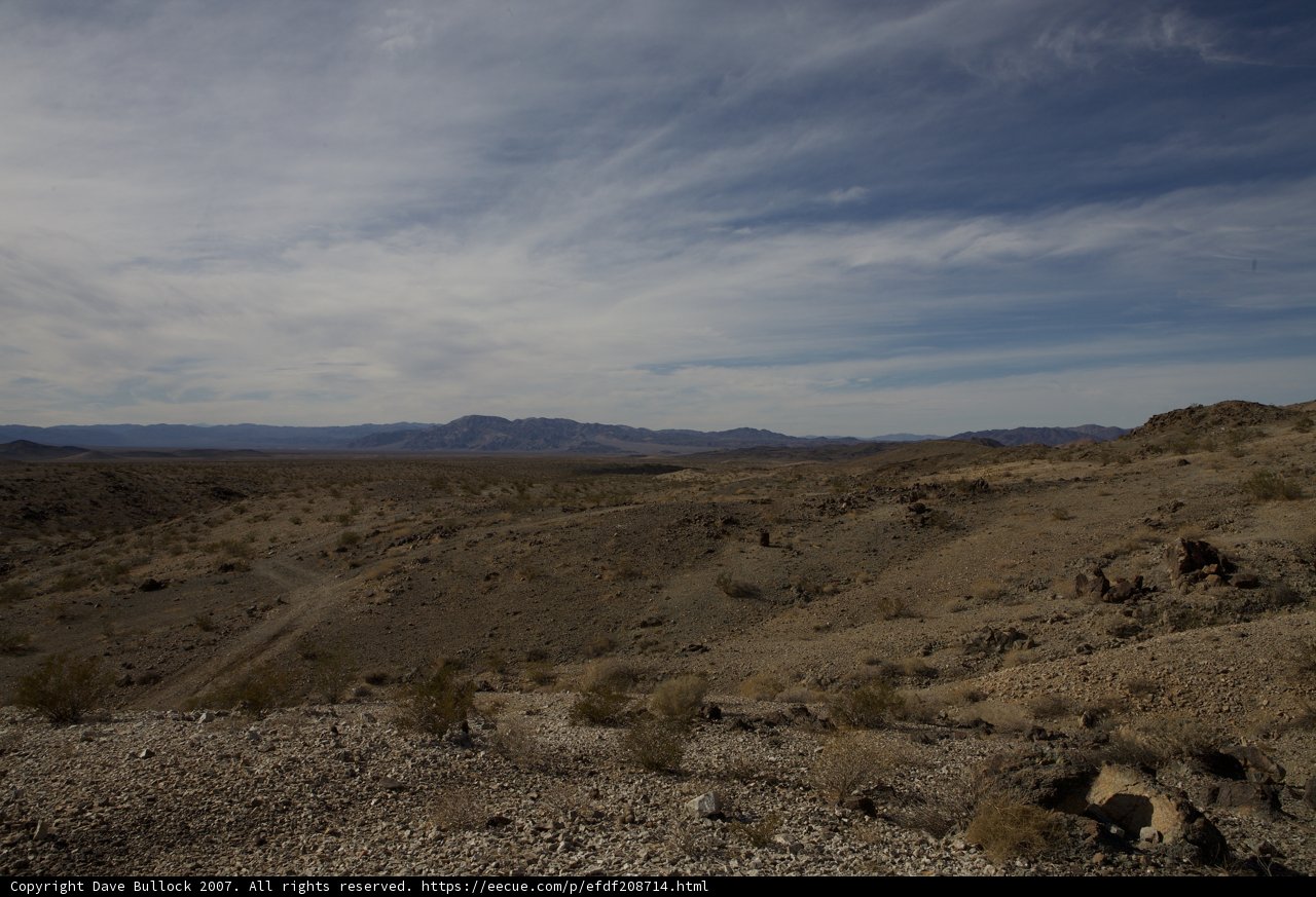 A Serene View of the Desert from a Hilltop