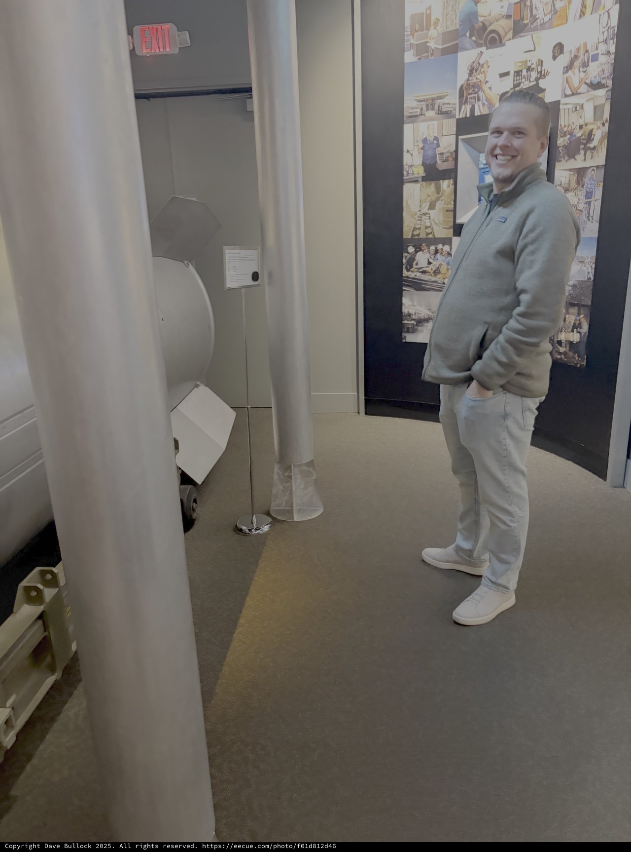 Museum Visitor Smiling at Interactive Space Exhibit
