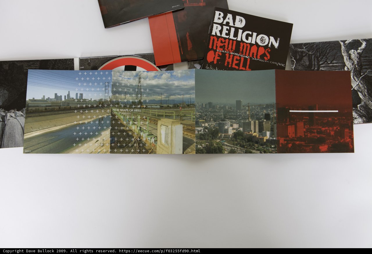 Reflections of Hell: A Collage of Cityscape and Advertisements