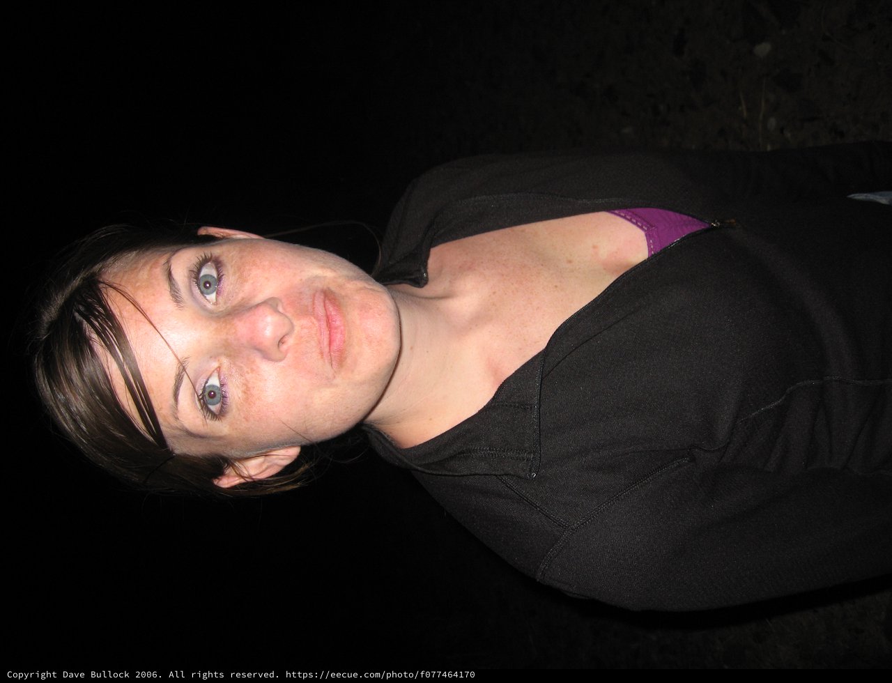 Young Woman Posing Outdoors at Night 2006