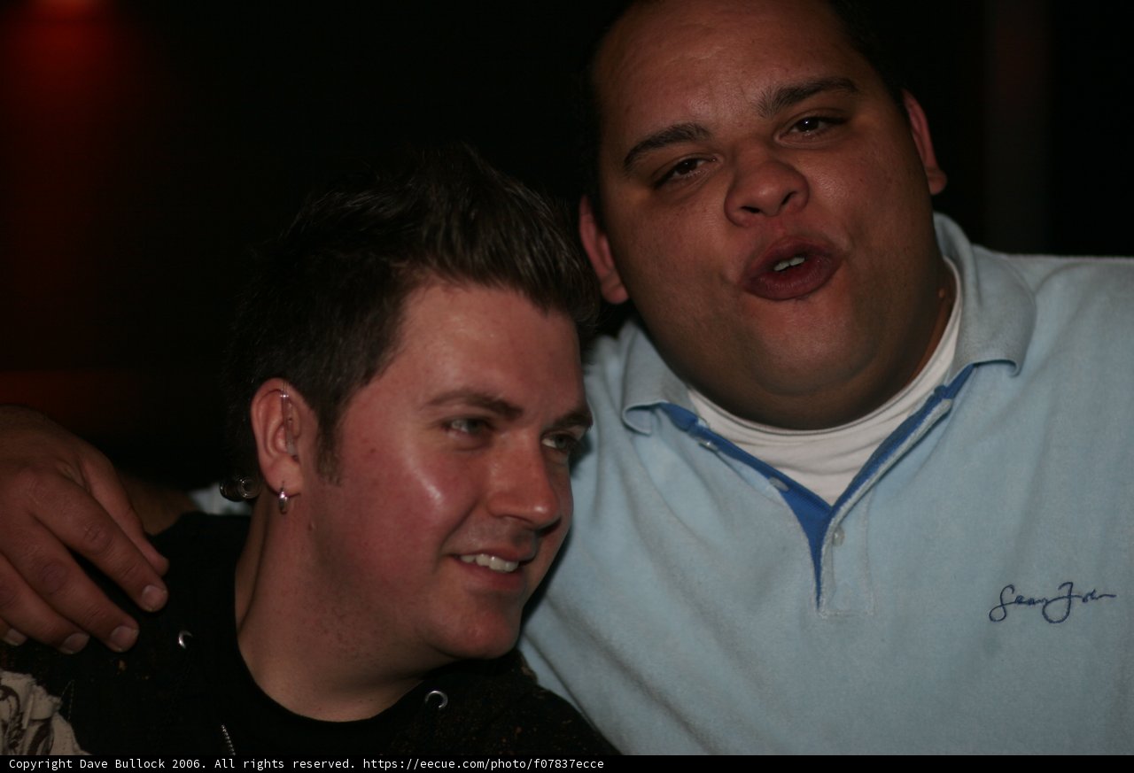 Two Men Strike a Pose