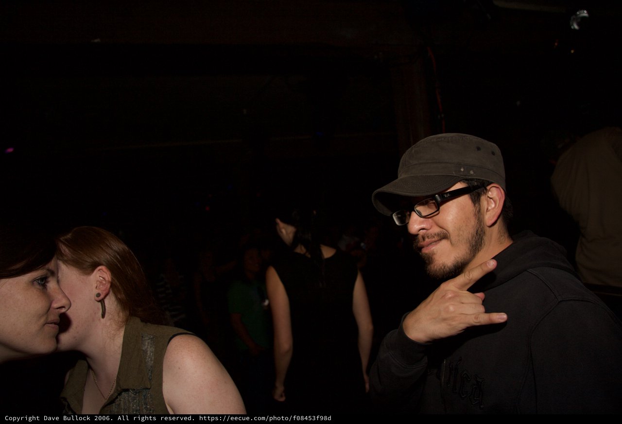Night Out: Two Friends at a Dark Venue