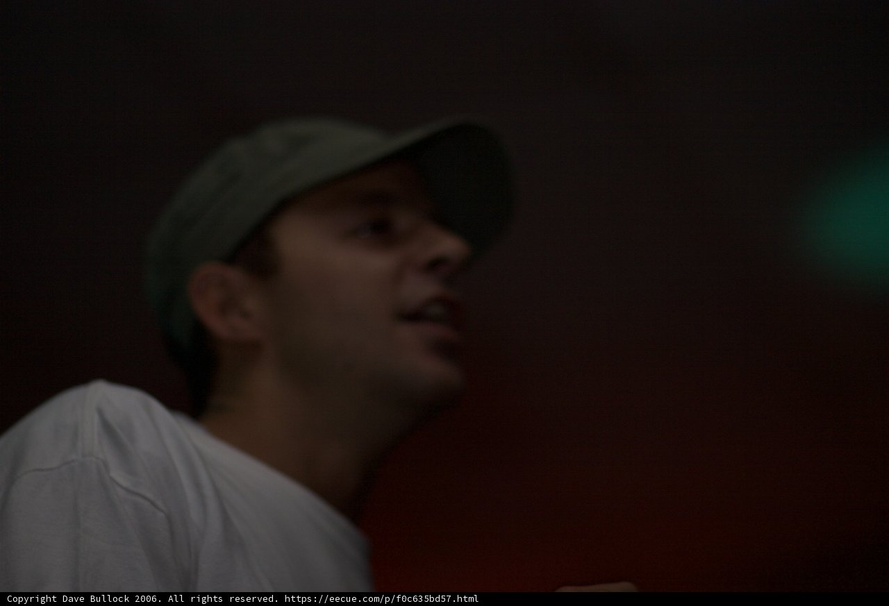 Looking Up in His Baseball Cap