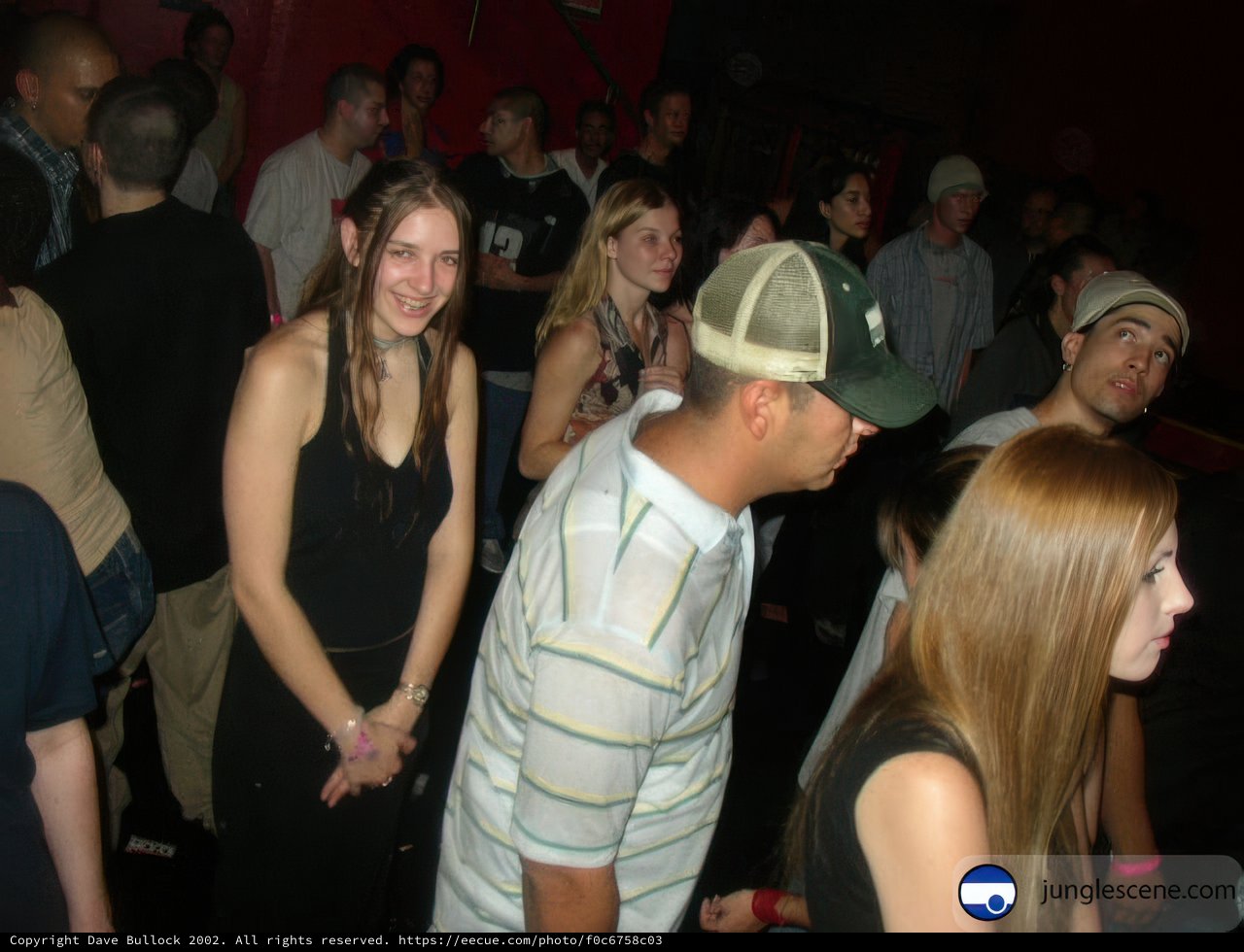 Nightclub Crowd with Baseball Caps