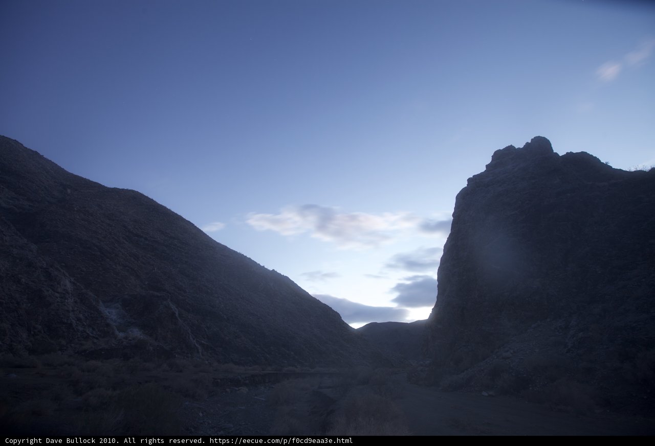 Dual Skies Over Majestic Mountain Range