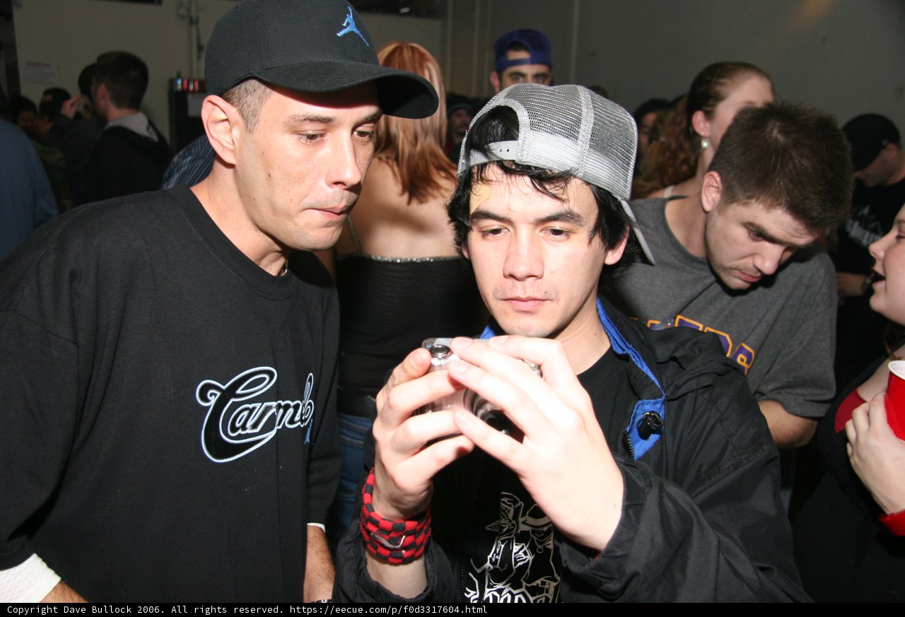 Man in Black Shirt in a Crowded Club