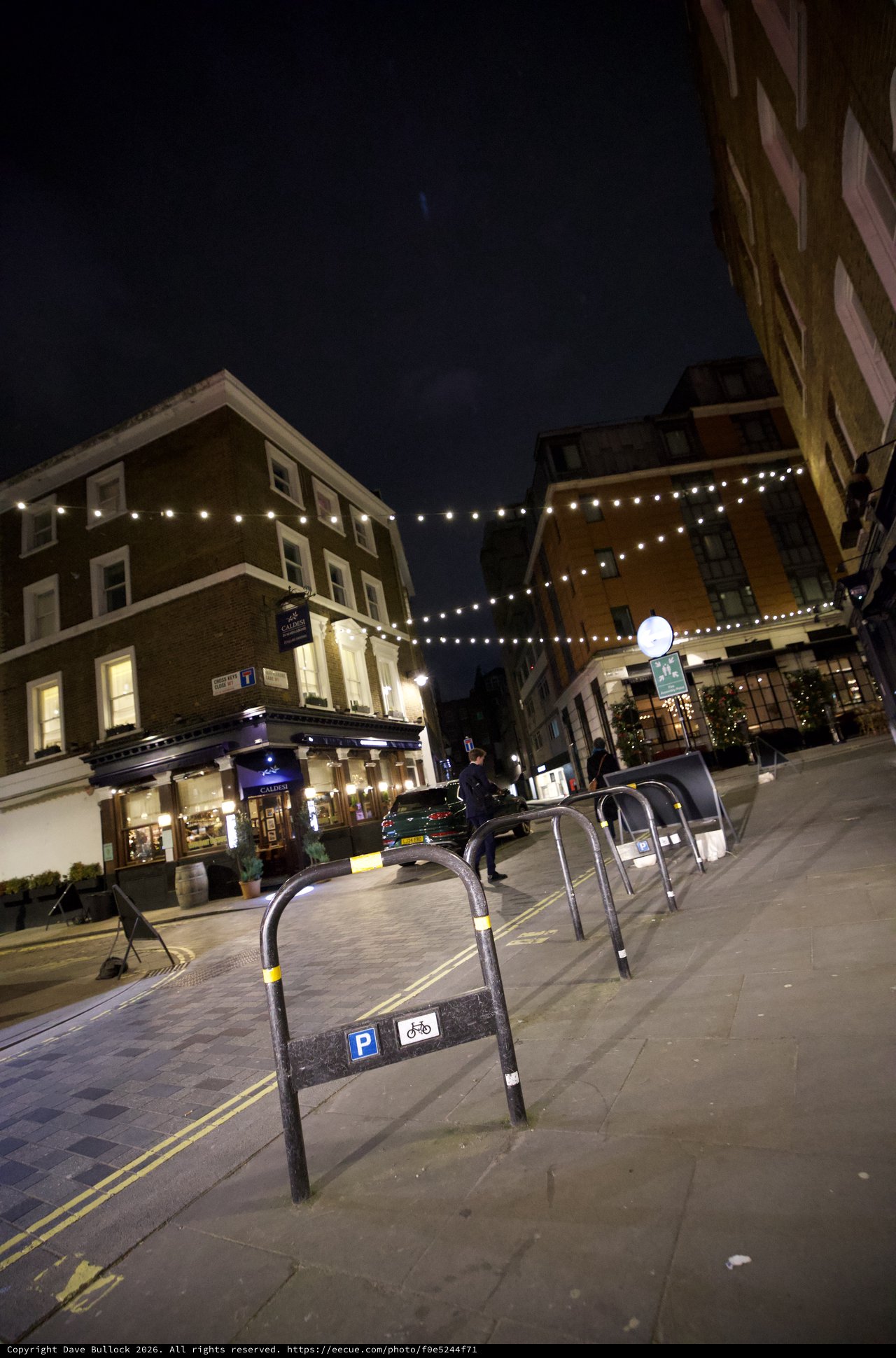 Evening Street Scene with Festive Lights in London