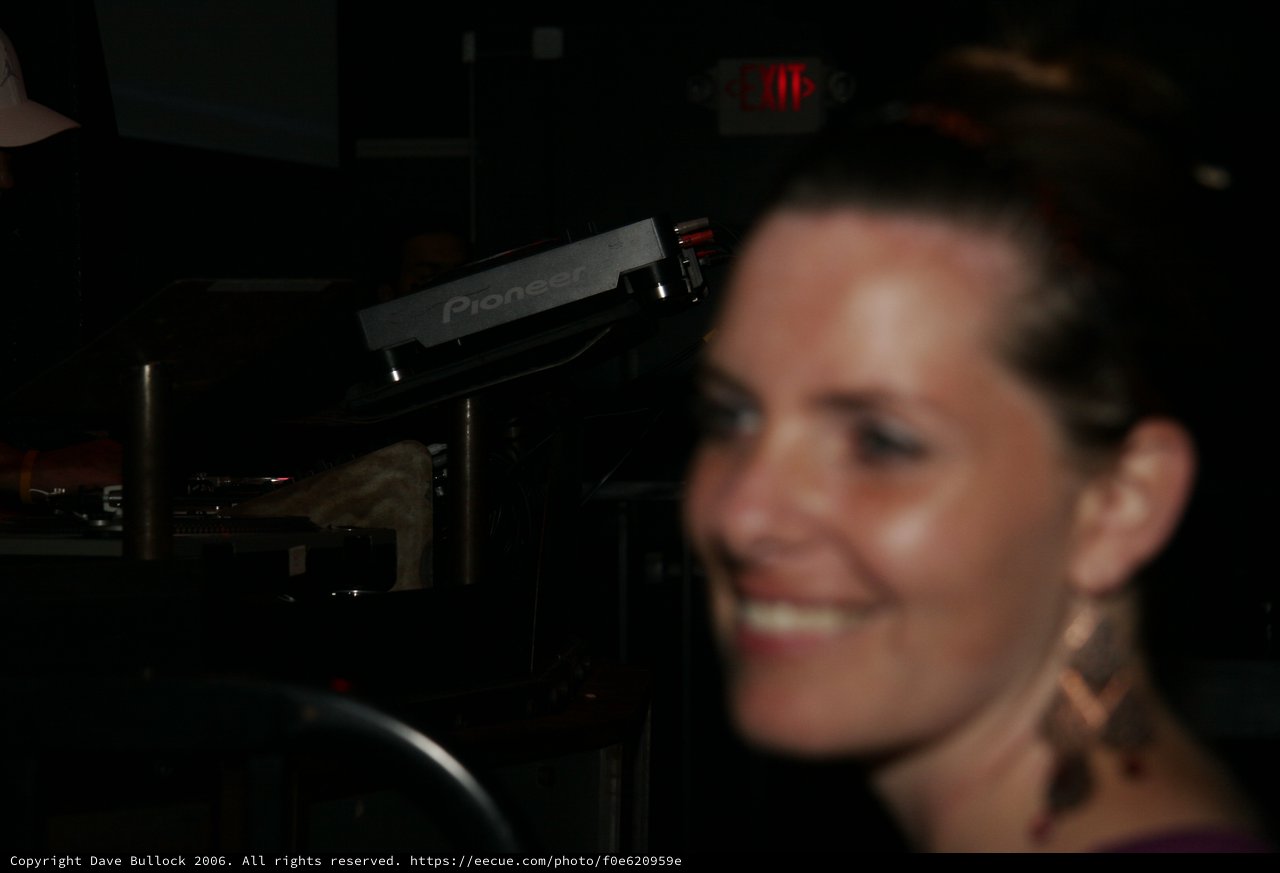 Smiling Woman at Nightclub DJ Booth 2006