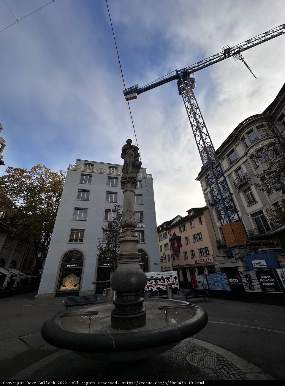 Cityscape Fountain with Construction Crane
