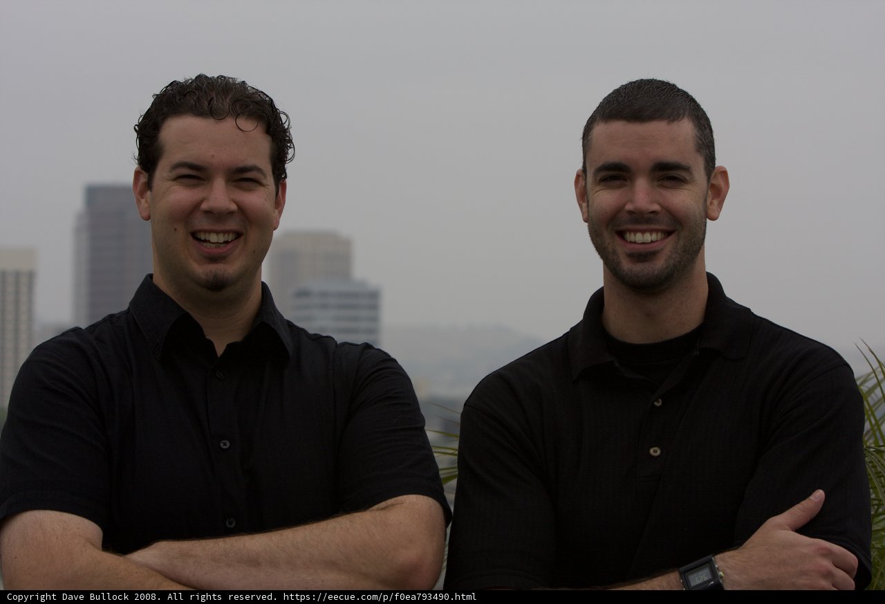 Two Happy Men Laughing Outdoors