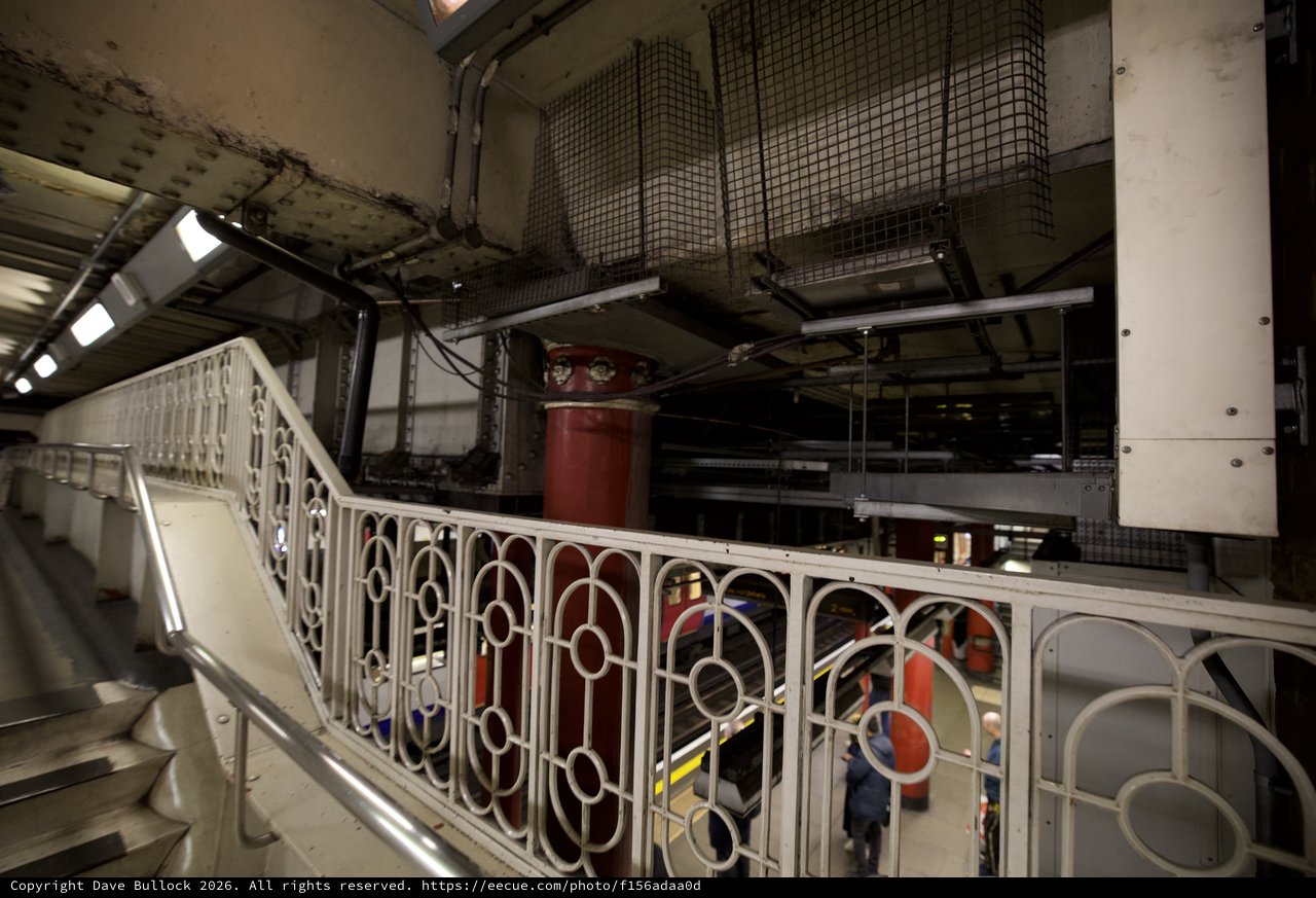 Industrial Underground Station Platform with Ornate Victorian Railings