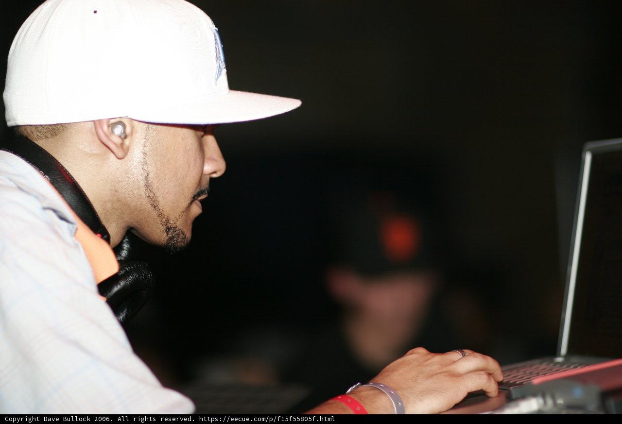 White Hat Man at the Laptop