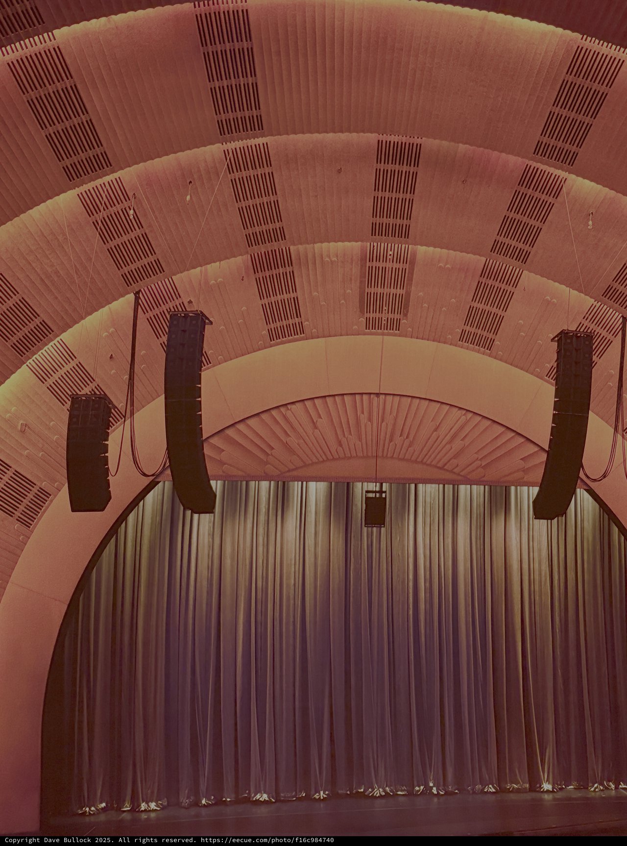 Dramatic Arched Ceiling with Suspended Lighting Elements