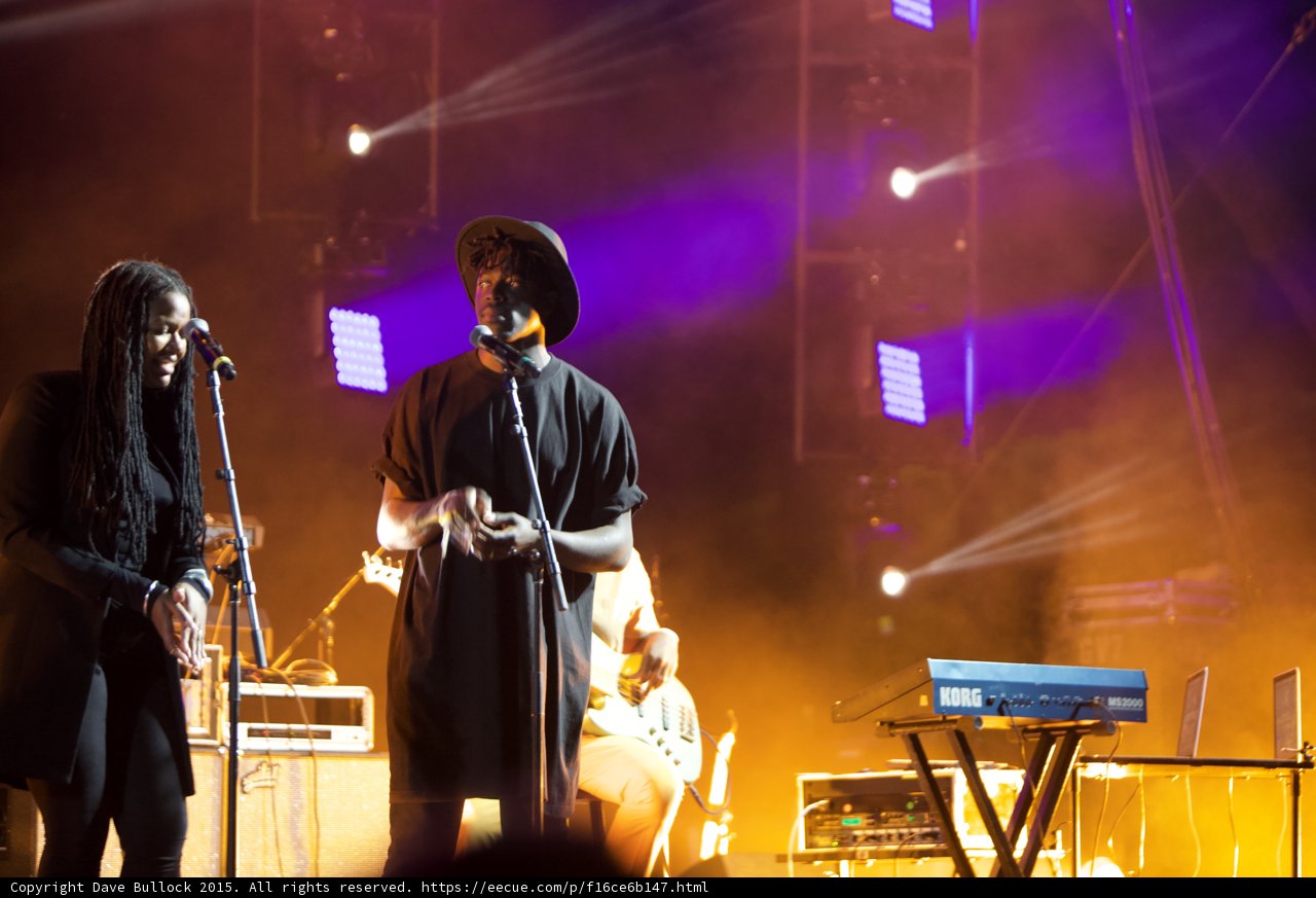 Solange Band Dreadlocks Vocalist Hat Bassist Korg Keyboard LED Panels Orange Purple