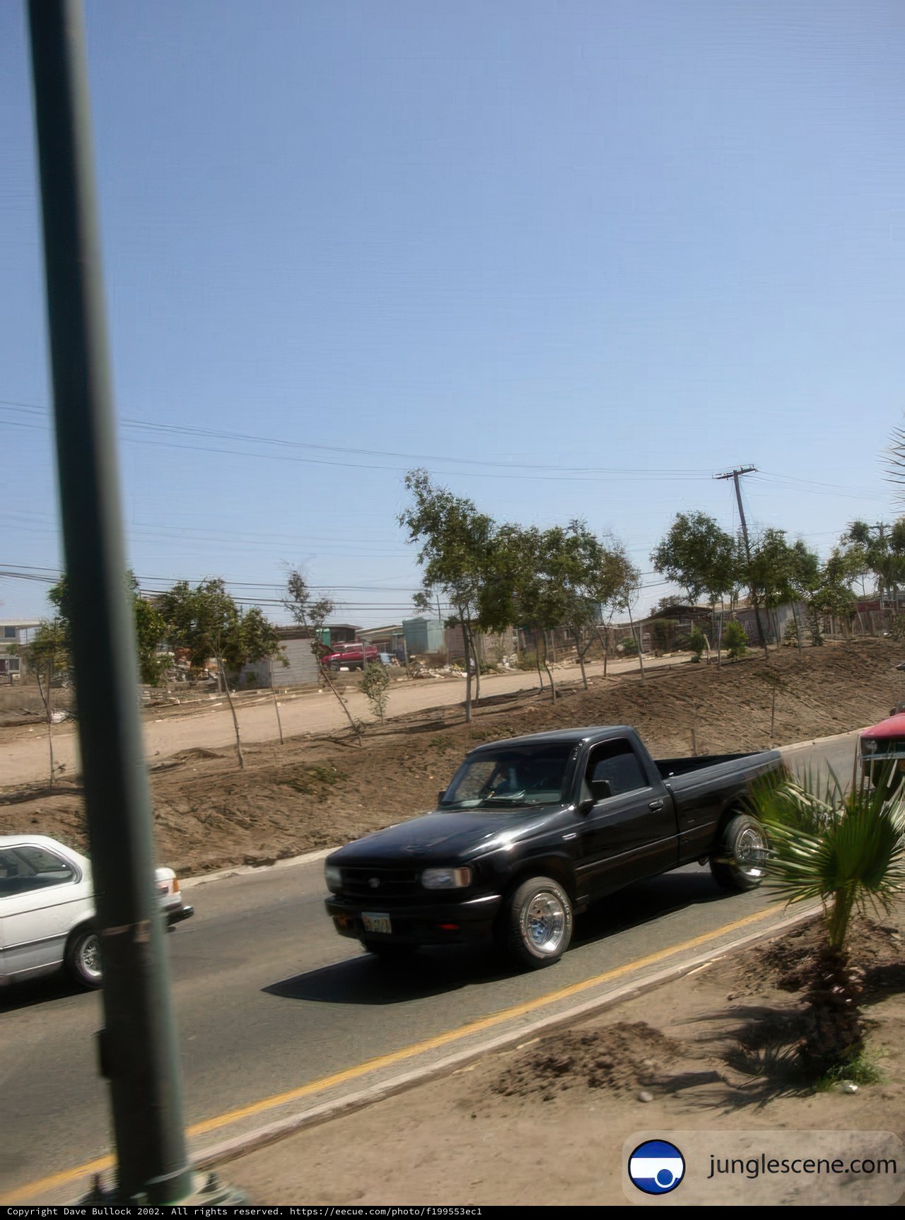 Black Pickup Truck on the Road