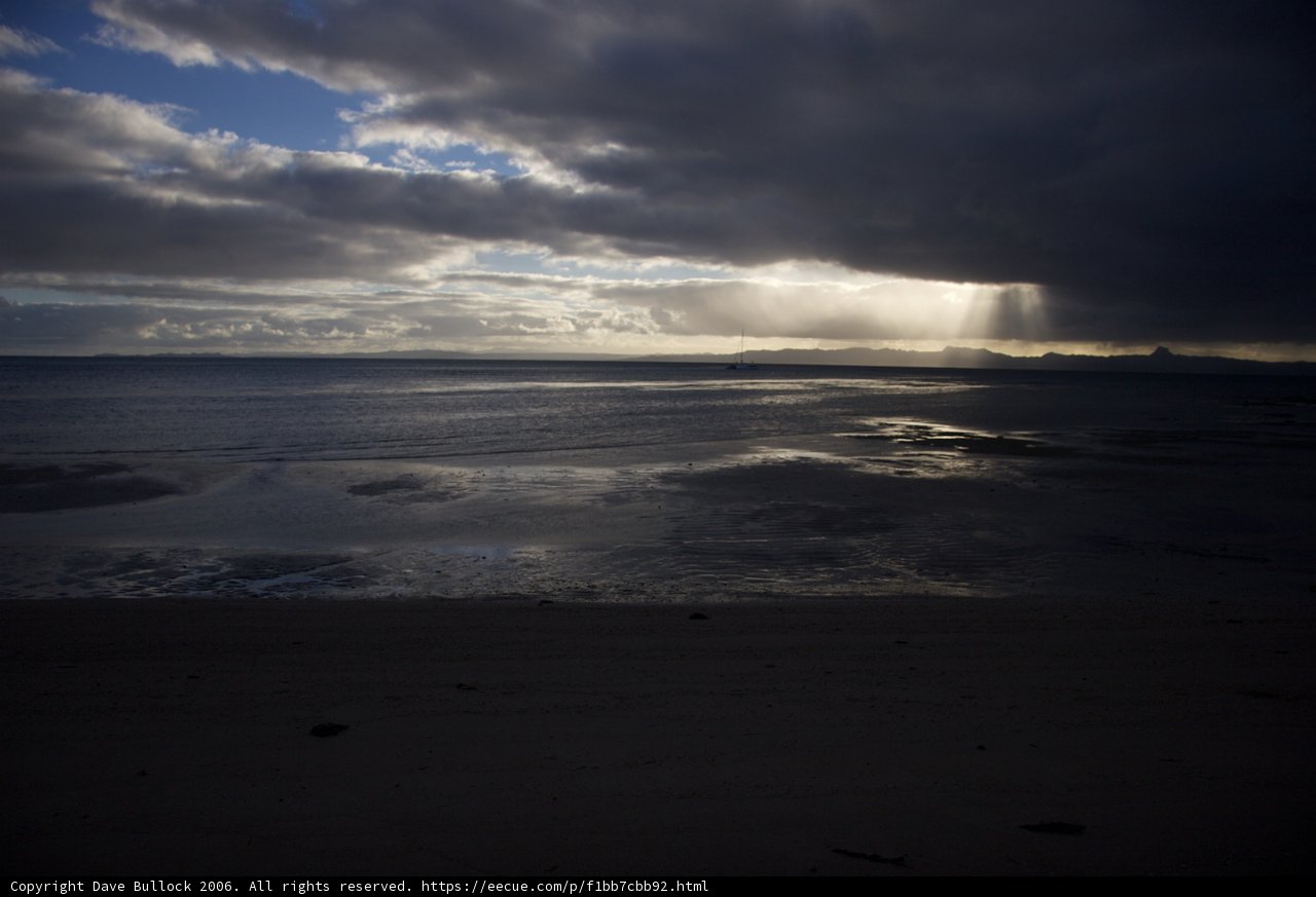 Sun's Golden Flare over the Ocean