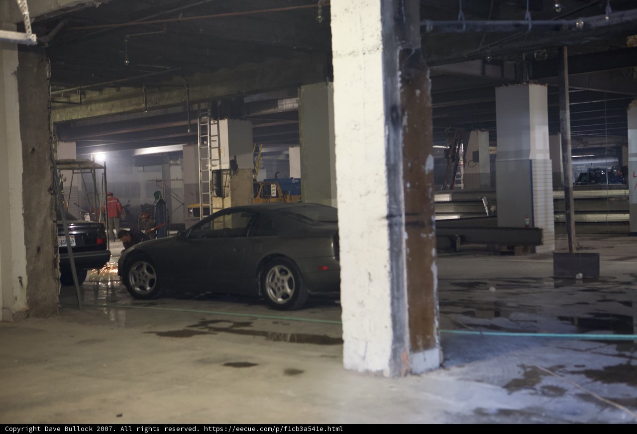 Parked Coupe in Empty Garage