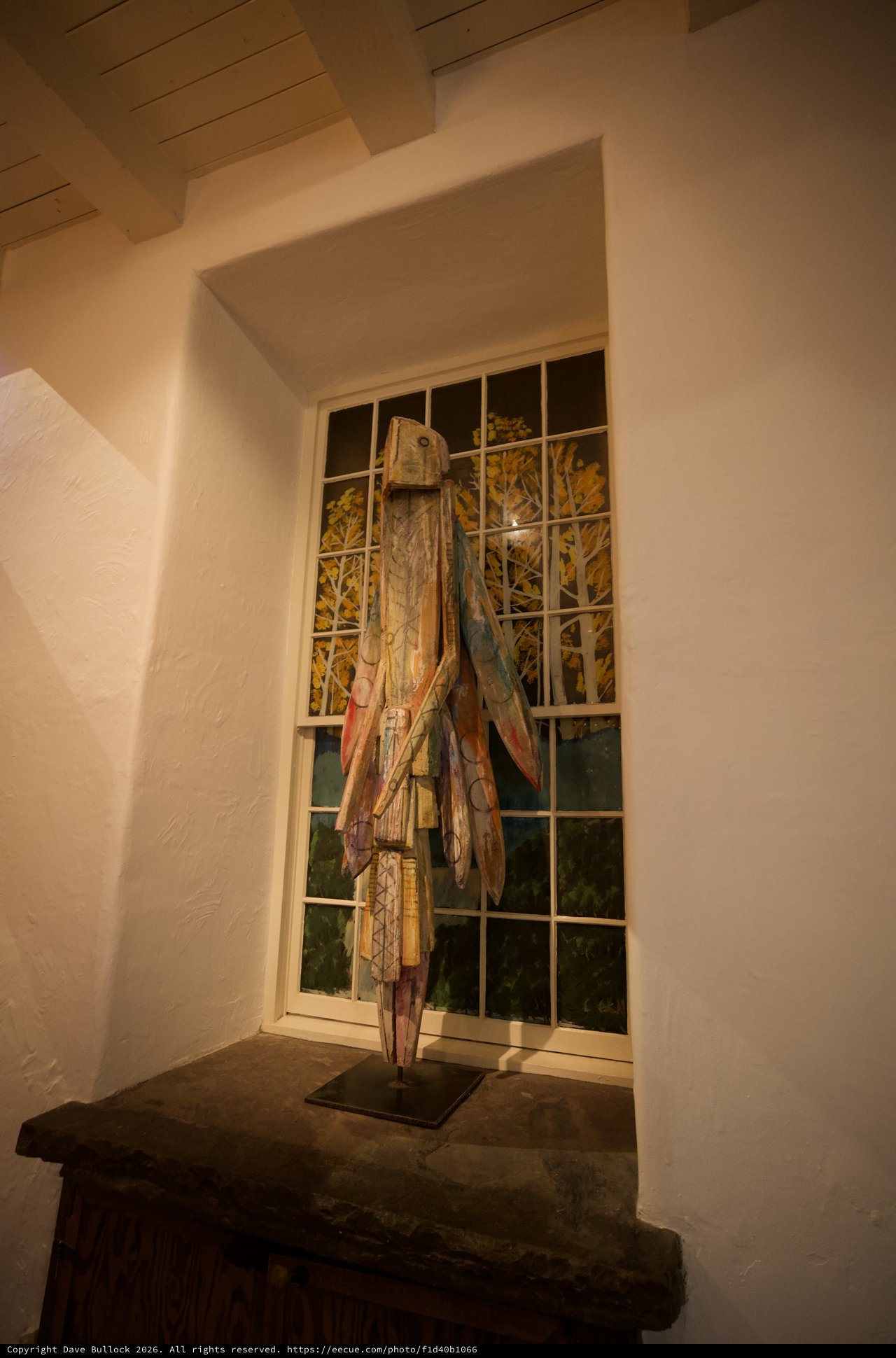 Weathered Folk Art Sculpture in Adobe Gallery Alcove