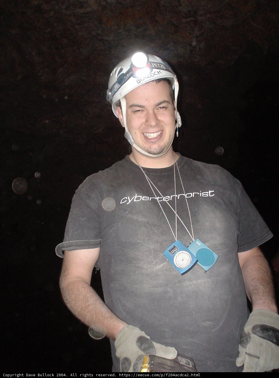Helmeted Man Shining Light