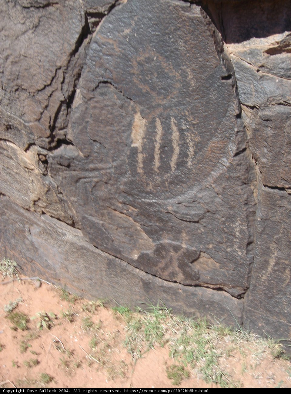 Hand and Face Carved in Slate Rock