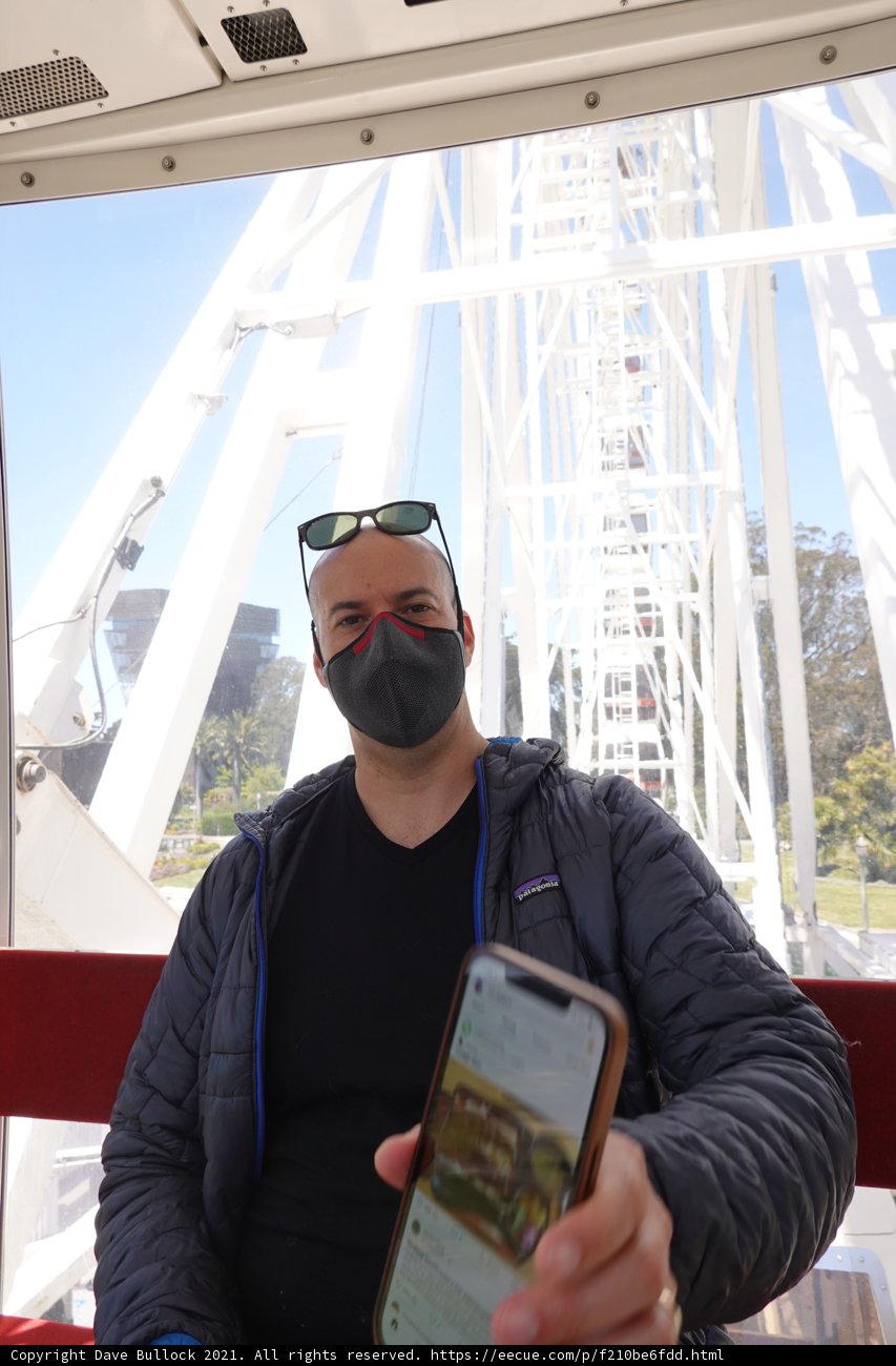 Masked Man with Mobile Phone