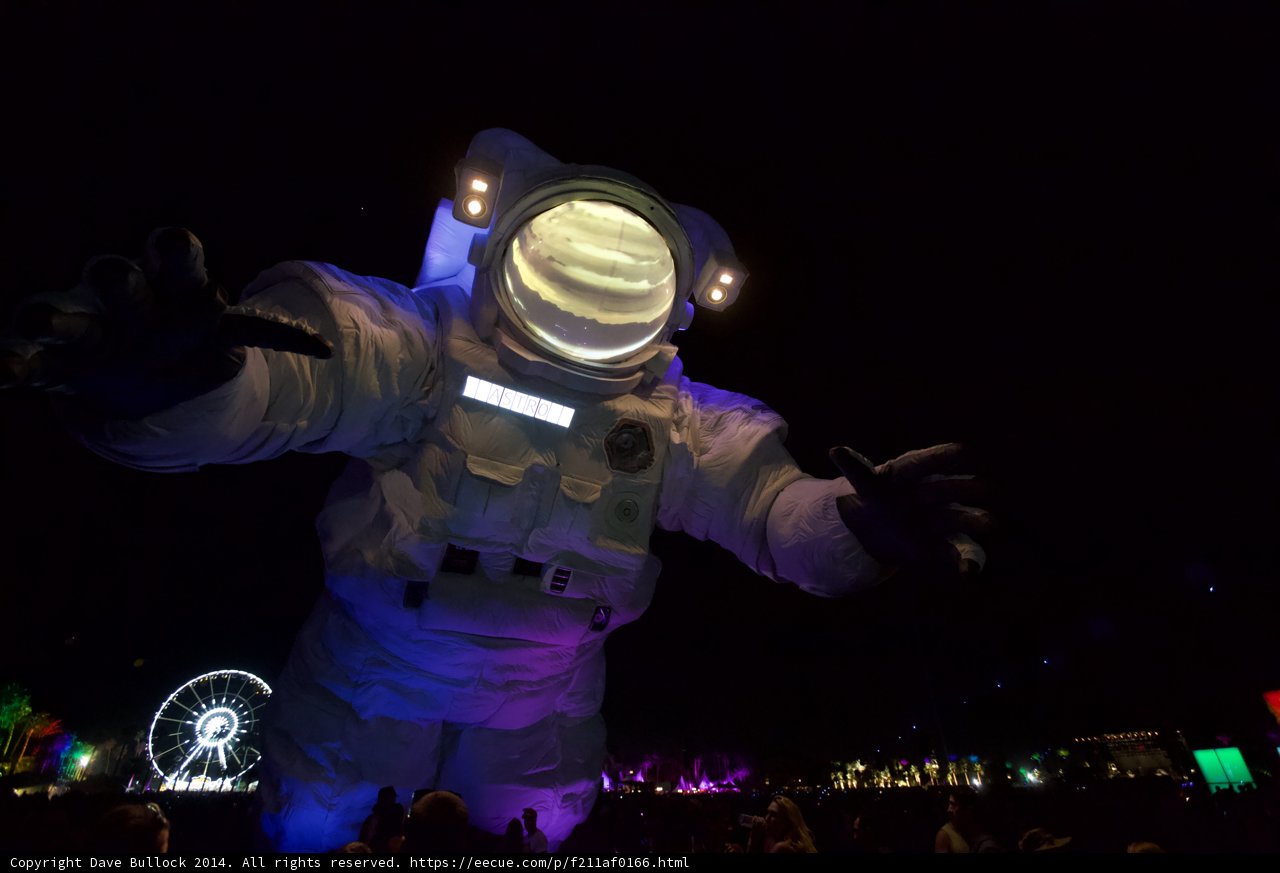 Giant Inflatable Astronaut Illuminated at Night
