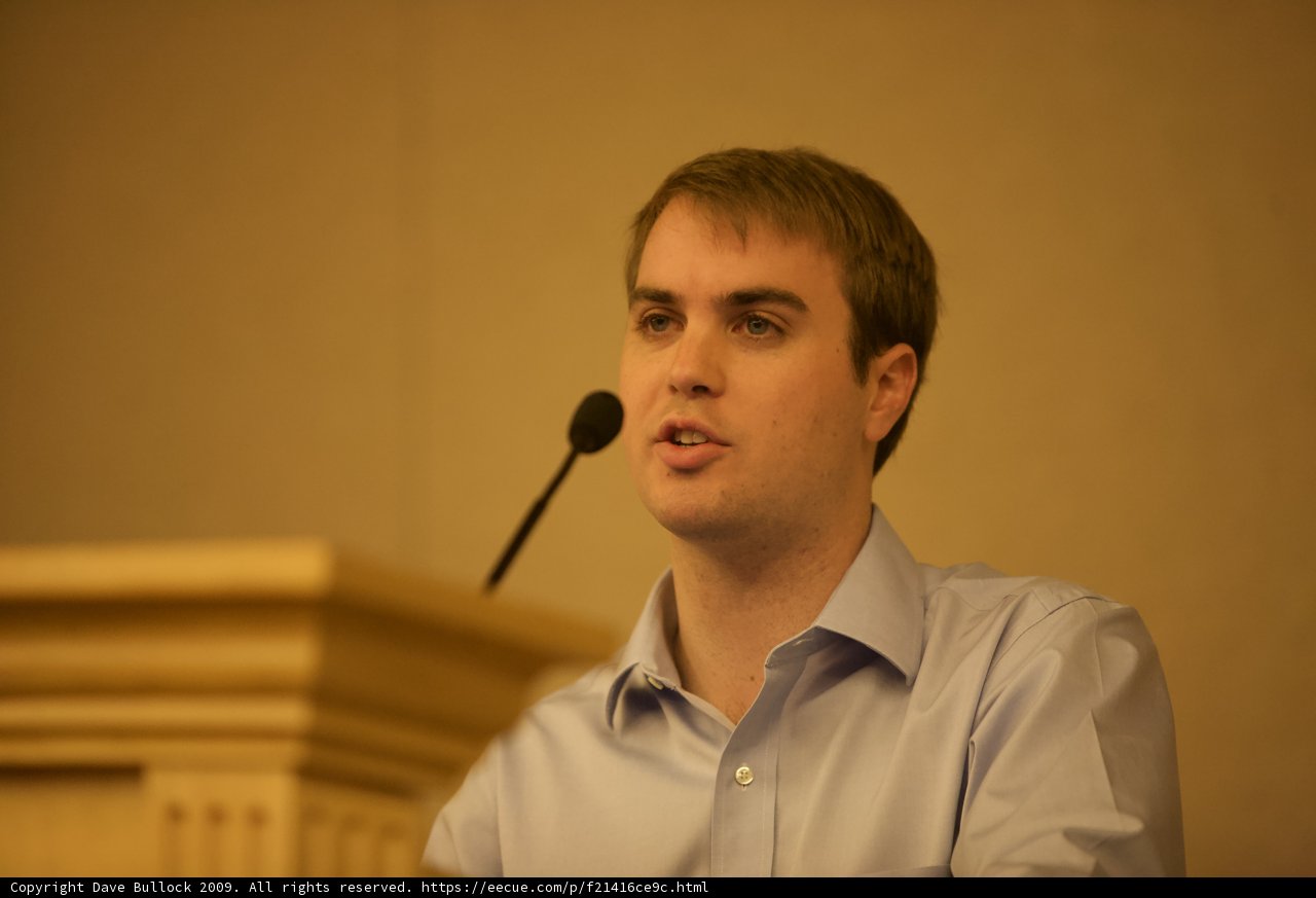 Blue-shirted Man Addresses the Crowd