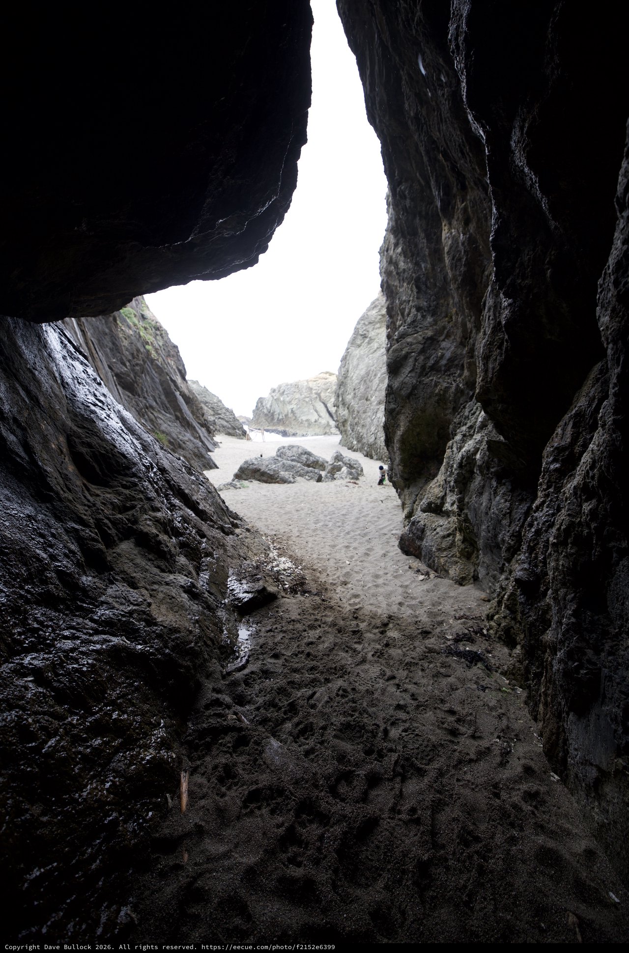 Looking Out Through a Sea Cave Opening to Beach